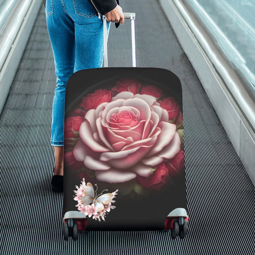 Luggage Cover Large Size 26-28 Large Pink Rose Person pulling a suitcase with a floral design on a moving walkway