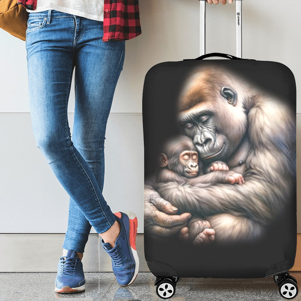 Person holding a suitcase with a gorilla and baby design