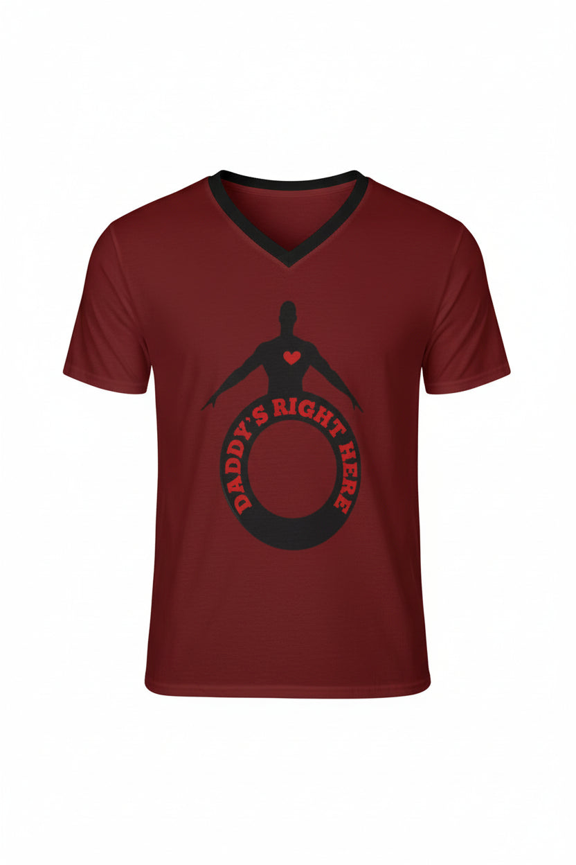 A man wearing a maroon red V-neck t-shirt with a black graphic on the chest that reads 'DADDY'S RIGHT HERE' with a silhouette of a person inside a circle.