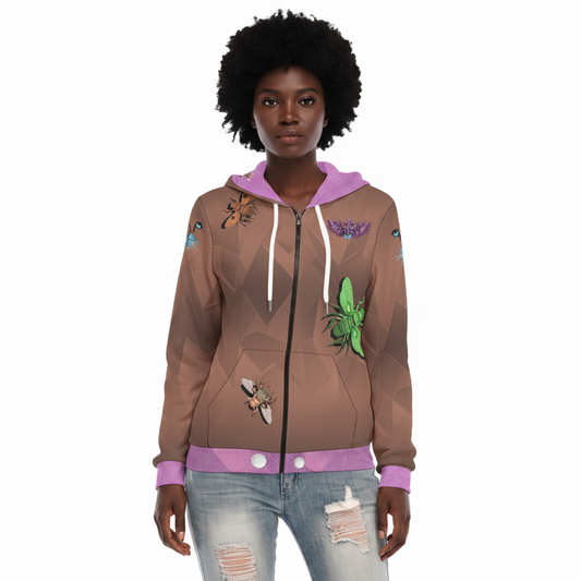 A woman modeling a brown zip-up hoodie with a geometric pattern, decorated with illustrations of insects like bees, butterflies, and a green beetle. The hoodie features a purple hood lining, white drawstrings, and a purple ribbed hem and cuffs, paired with distressed blue jeans against a plain white background.