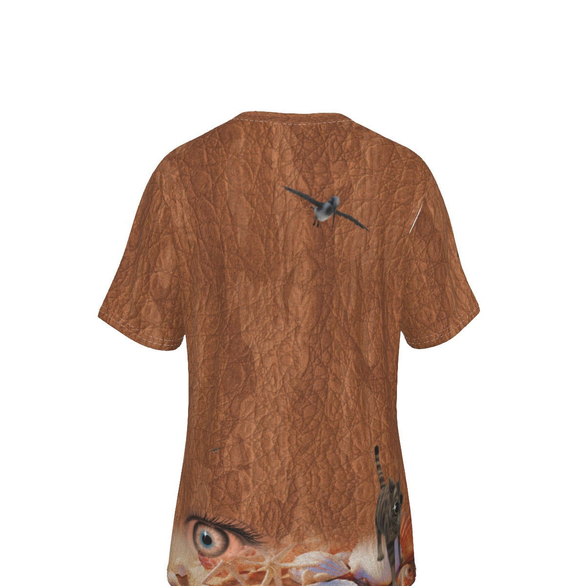 A brown short-sleeve t-shirt with a textured bark-like print, featuring a bird on the upper back and a realistic animal eye graphic near the lower hem, shown against a plain white background.