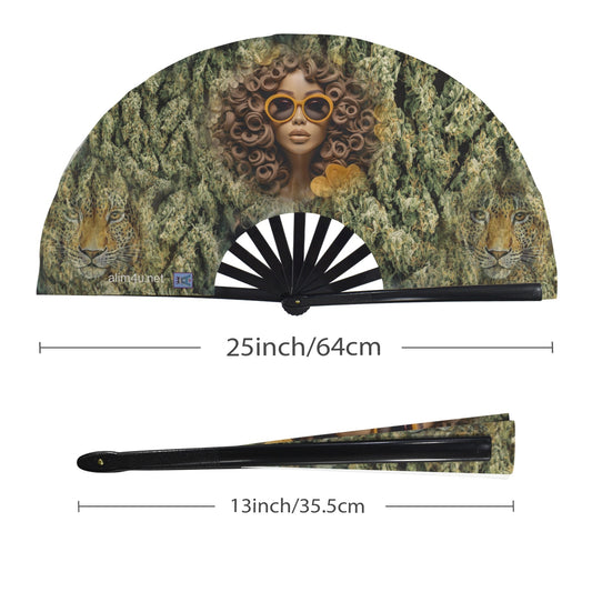 Decorative fan with a woman's face and leopards' heads on a green leafy background, with measurements displayed.