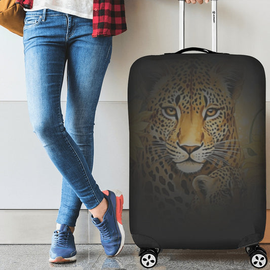 Person holding a suitcase with a leopard design