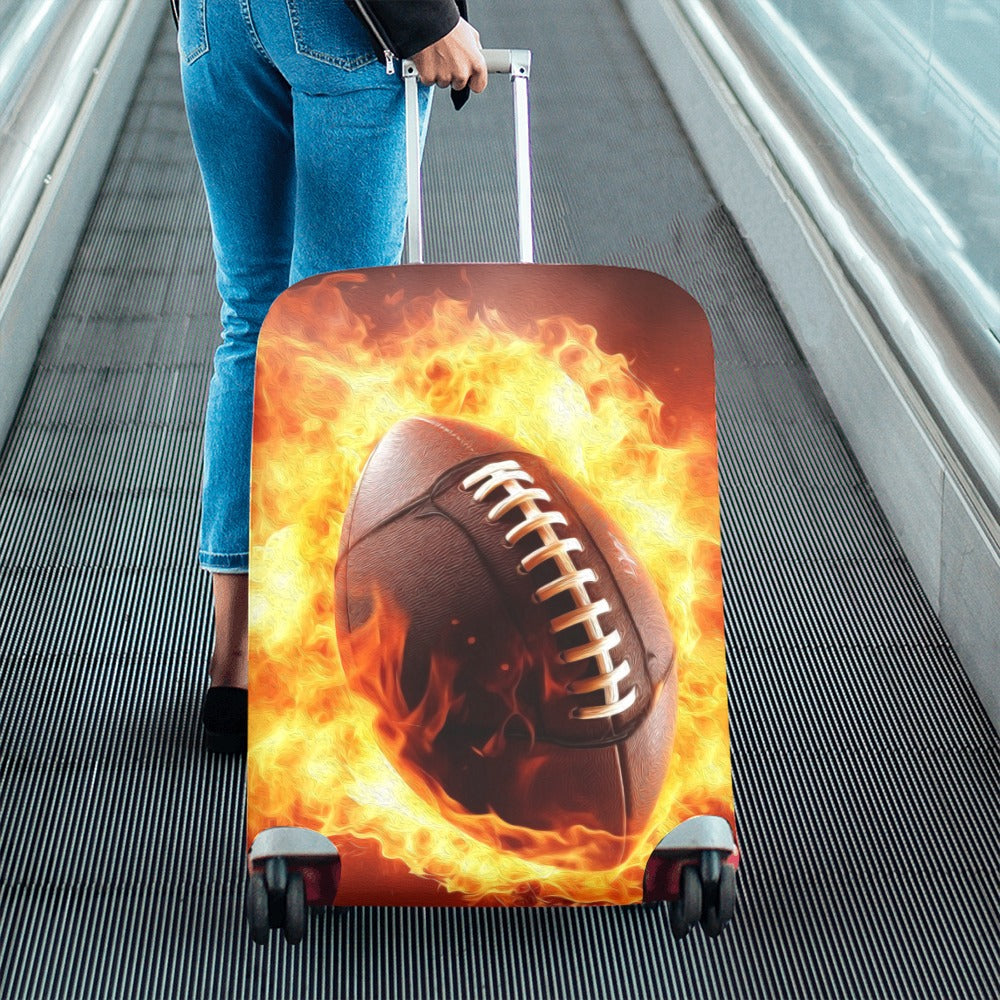 Person pulling a suitcase with a football design on fire