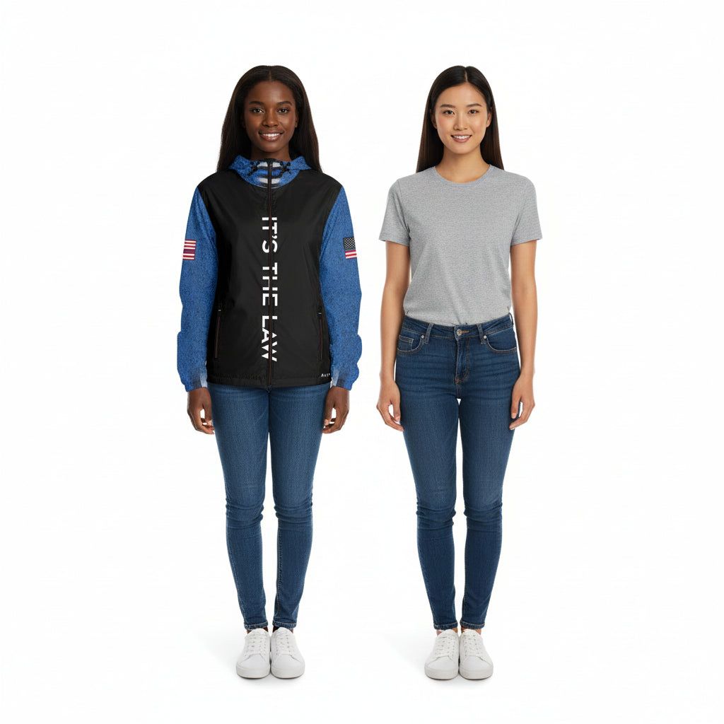 Person wearing a black and blue jacket with text on a white background