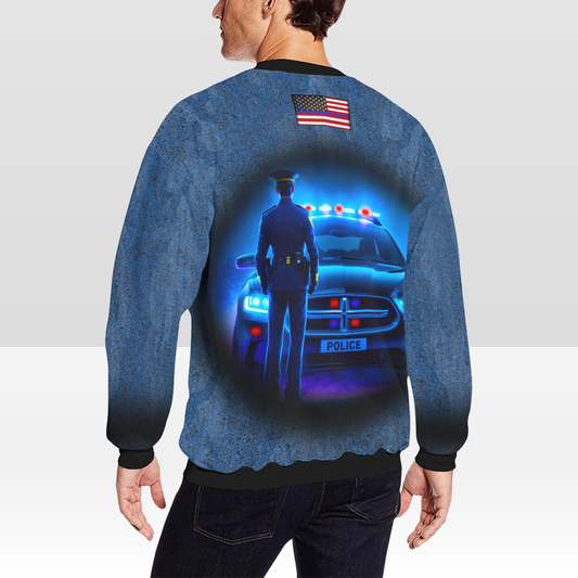 Person wearing a blue sweatshirt with a graphic of a police officer and car on the back.